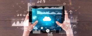 handholdingtabletandcheckingfinantialreportoncloudcomputing