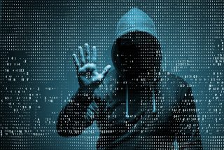 Young,Hacker,In,Data,Security,Concept